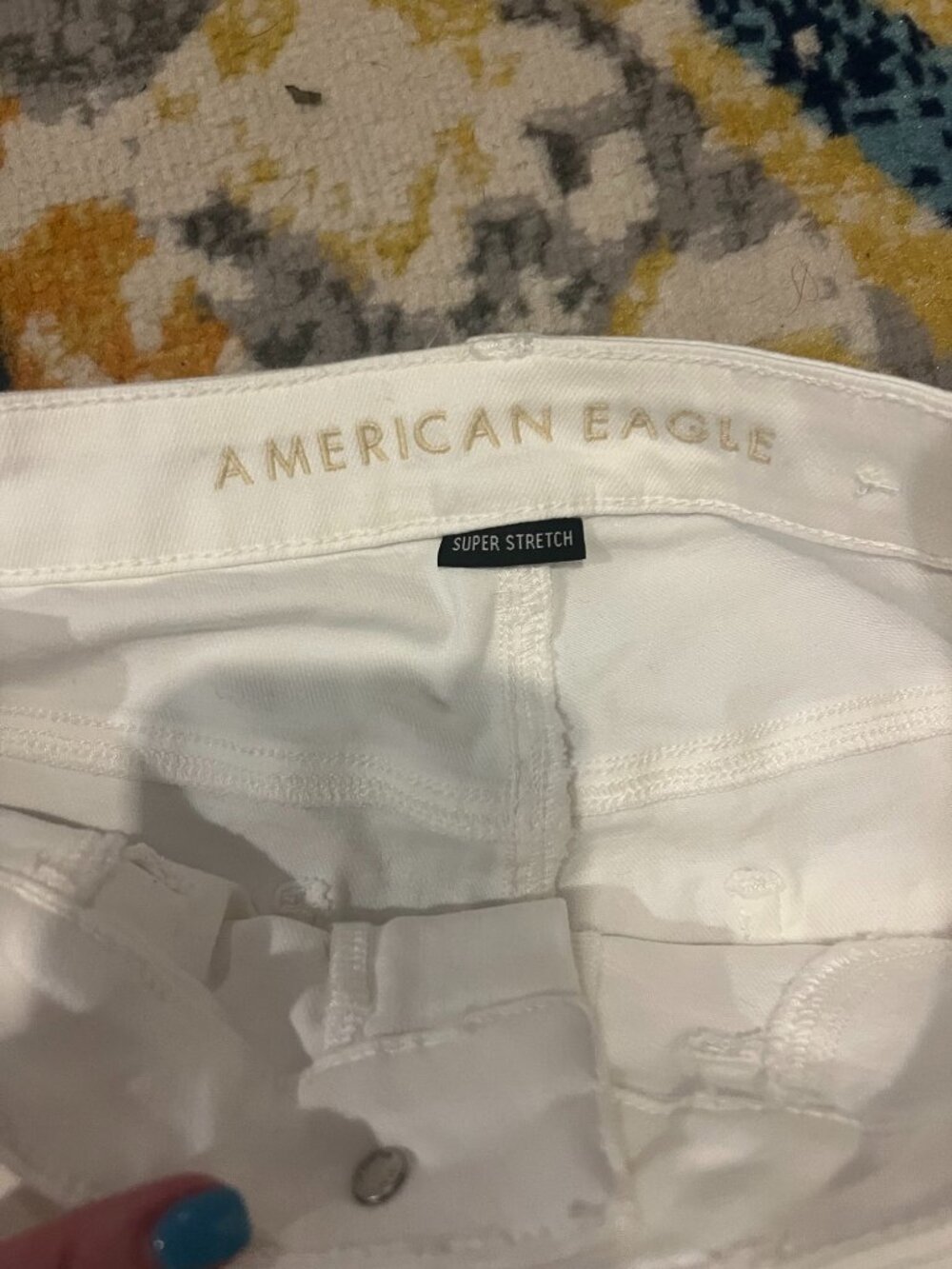 American Eagle White Super Stretch Ripped Knee Skinny Jeans - Picture 3 of 5